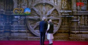 PM Modi shows the ancient 13th century Konark wheel to US President Joe Biden after greeting him at the venue