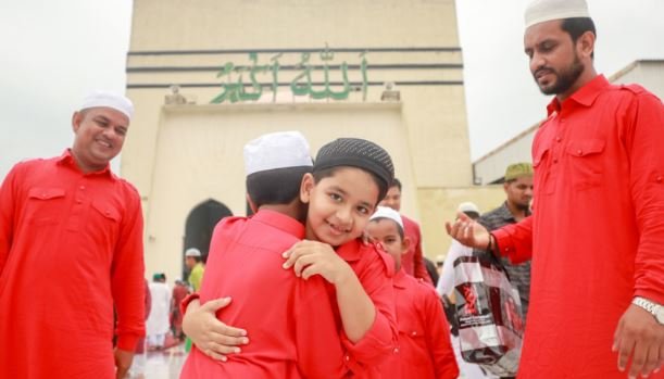 Eid prayers embracing 