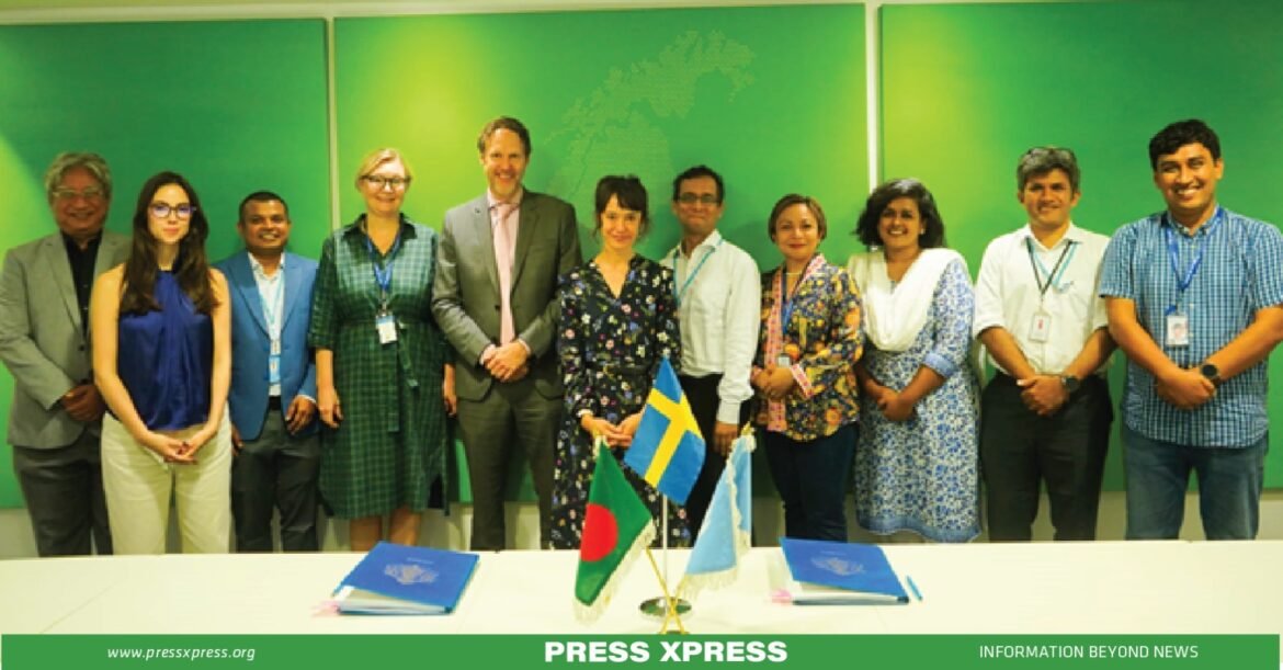 Representatives from UNDP, UNCDF, the European Union, the Government of Bangladesh, and Sweden unite, symbolizing their collective commitment to the LoGIC project and climate resilience.