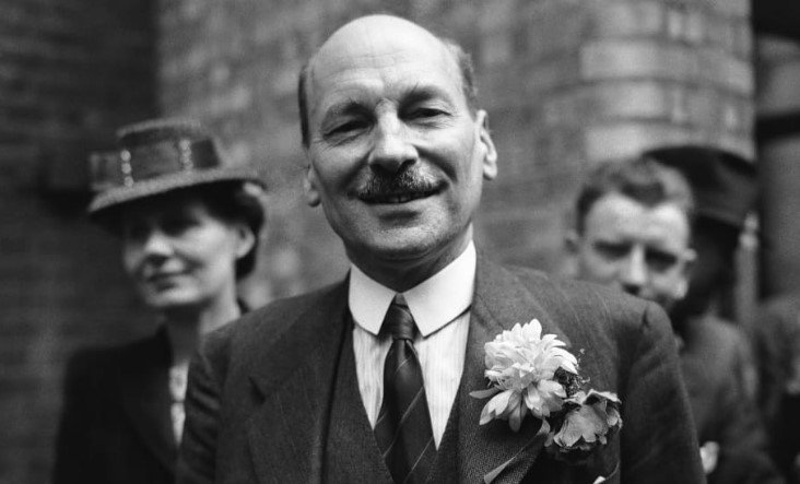 Clement Attlee at Transport House in London on July 26, 1945, to hear that Labour had won the elections [Leslie Priest/AP Photo]